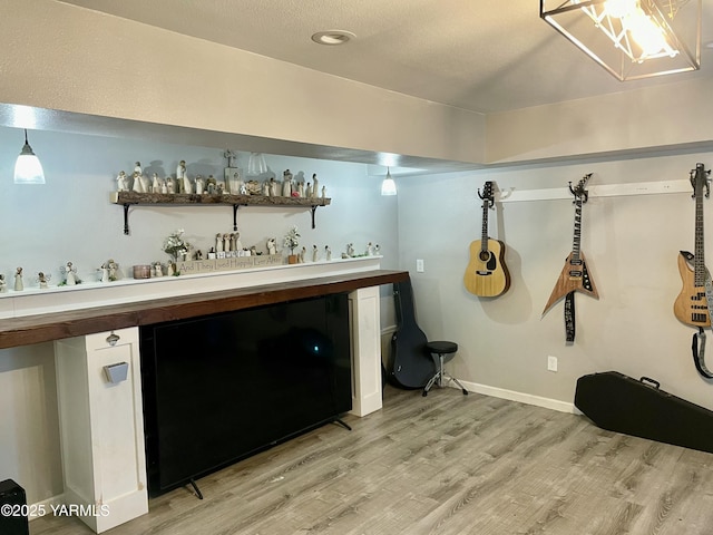 106 S G St, Toppenish, WA 98948 - interior space featuring light wood-style flooring, baseboards, and a dry bar