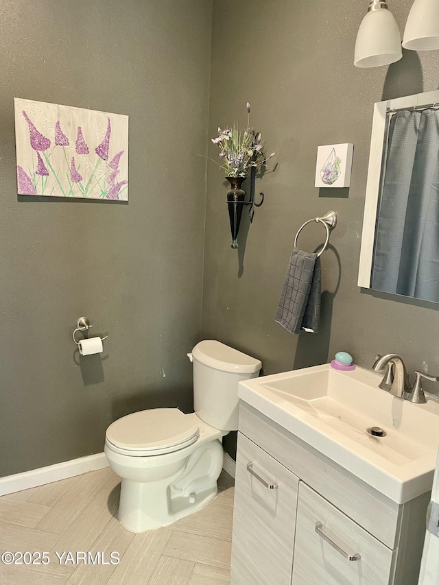 106 S G St, Toppenish, WA 98948 - full bath featuring baseboards, toilet, and vanity