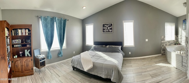106 S G St, Toppenish, WA 98948 - bedroom with vaulted ceiling, baseboards, and wood tiled floor