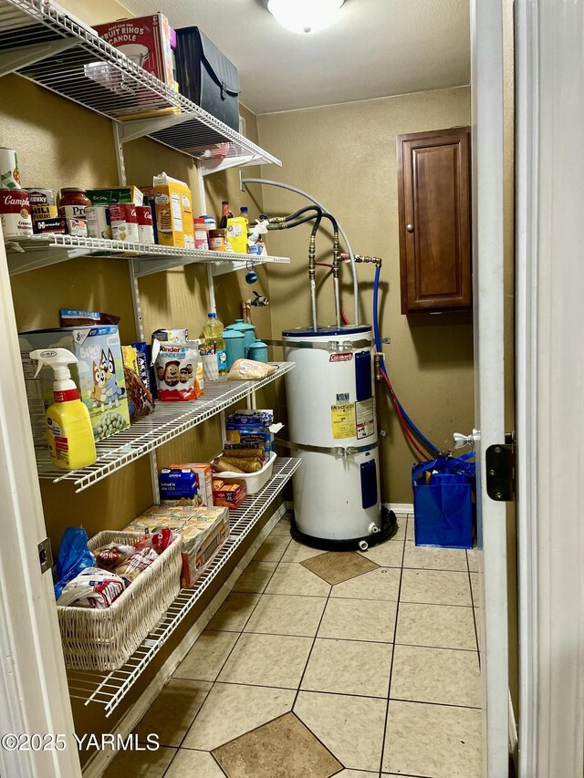 106 S G St, Toppenish, WA 98948 - utility room featuring secured water heater