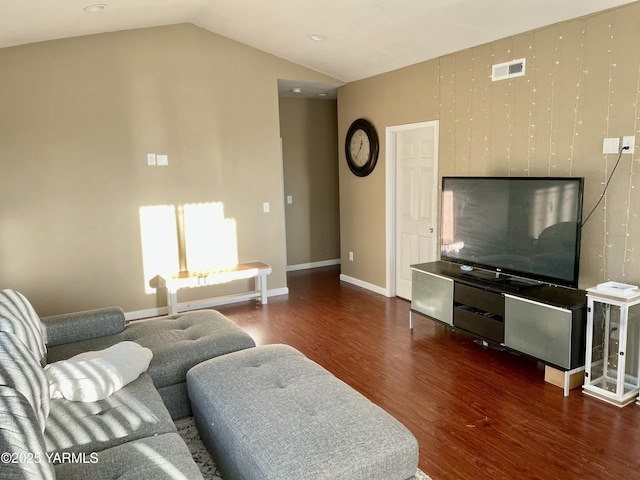 106 S G St, Toppenish, WA 98948 - living area featuring visible vents, baseboards, wood finished floors, and vaulted ceiling