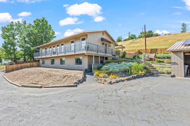 14661 Wide Hollow Rd, Yakima, WA 98908 - back of house featuring a balcony and stairway