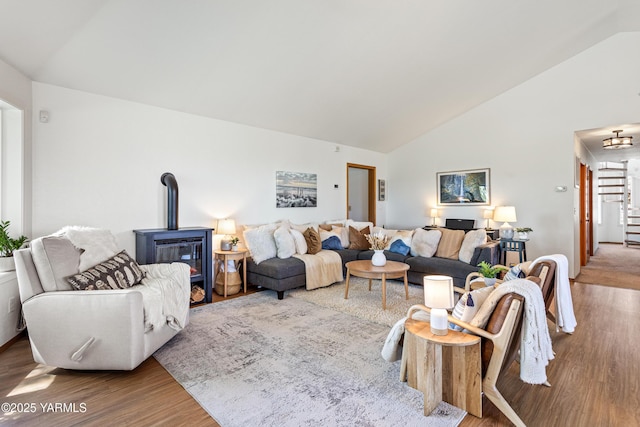 12826 Douglas Rd, Yakima, WA 98908 - living room with wood finished floors, high vaulted ceiling, and stairway