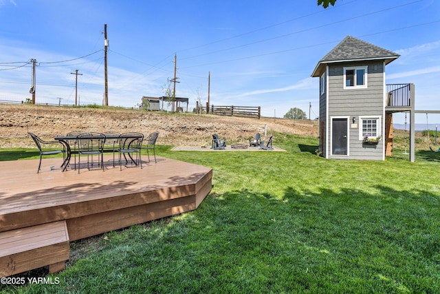 12826 Douglas Rd, Yakima, WA 98908 - view of grassy yard with a fire pit and a deck