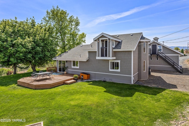 12826 Douglas Rd, Yakima, WA 98908 - back of property with a shingled roof, a wooden deck, and a yard