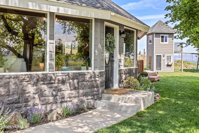 12826 Douglas Rd, Yakima, WA 98908 - view of exterior entry featuring a lawn
