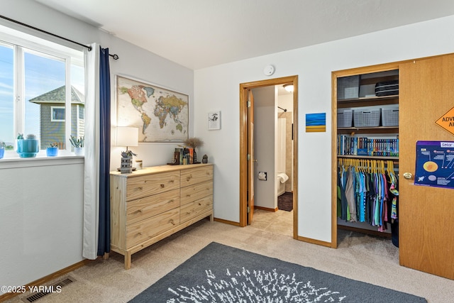 12826 Douglas Rd, Yakima, WA 98908 - bedroom with a closet, light carpet, and baseboards