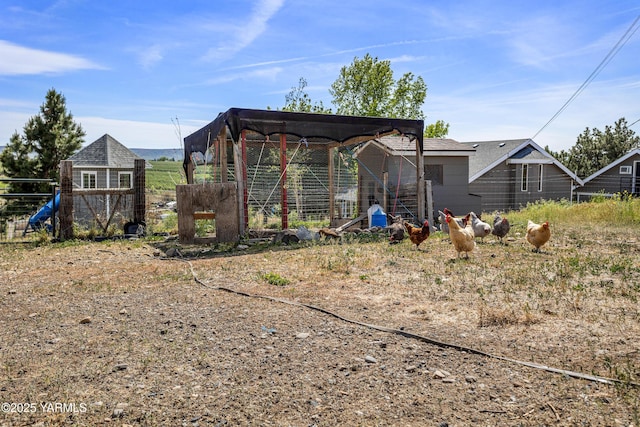 12826 Douglas Rd, Yakima, WA 98908 - view of yard featuring exterior structure and an outbuilding