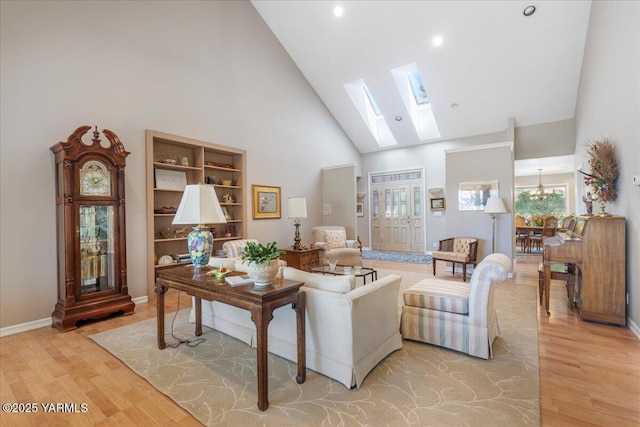621 Friedline Rd, Yakima, WA 98908 - living room with high vaulted ceiling, light wood-style floors, and a skylight