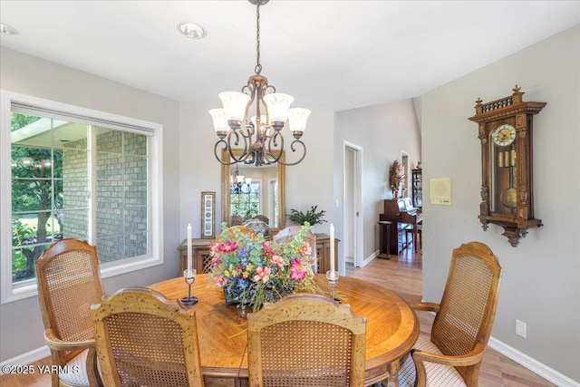 621 Friedline Rd, Yakima, WA 98908 - dining area with a chandelier, healthy amount of natural light, and light wood-type flooring