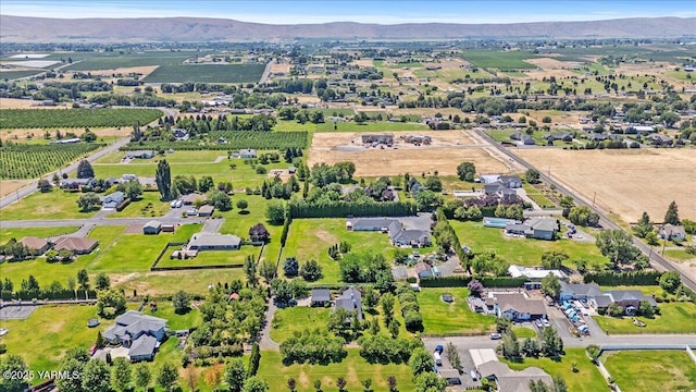 621 Friedline Rd, Yakima, WA 98908 - aerial overview of property's location featuring large plots for crops, rural landscape, and a mountainous background