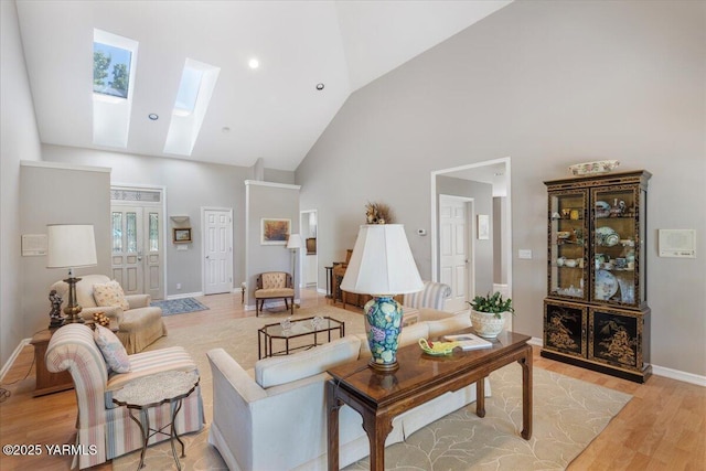 621 Friedline Rd, Yakima, WA 98908 - living area with a skylight, high vaulted ceiling, and light wood-style floors