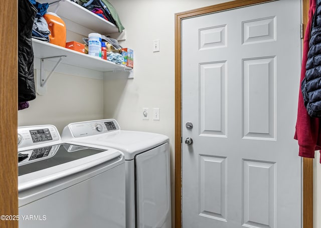 washroom with laundry area and washer and clothes dryer