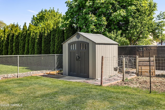 view of shed with fence
