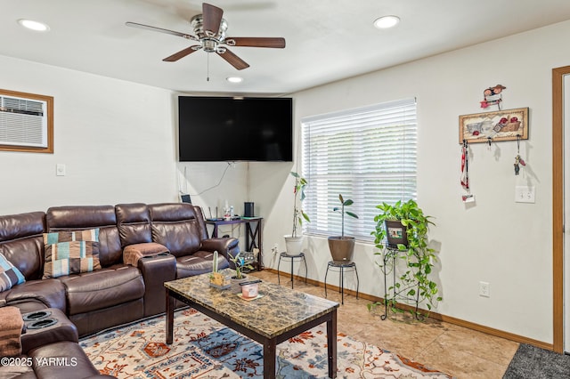 living room featuring light tile patterned floors, baseboards, a ceiling fan, and recessed lighting