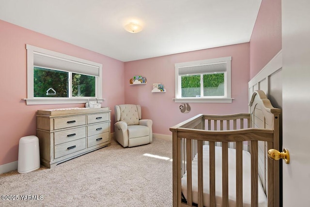 5310 W Lincoln Ave, Yakima, WA 98908 - carpeted bedroom with multiple windows and a crib