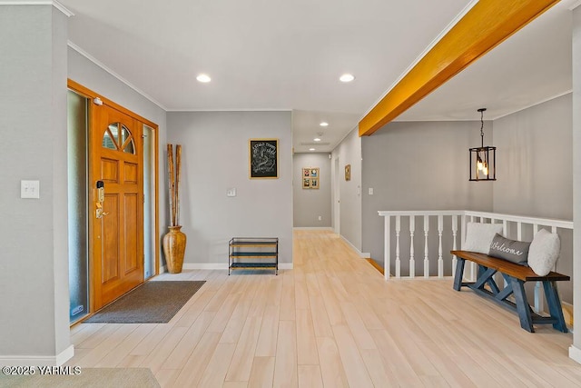 5310 W Lincoln Ave, Yakima, WA 98908 - foyer with light wood-type flooring, a chandelier, recessed lighting, and ornamental molding