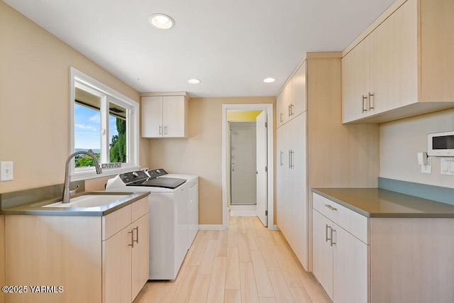 5310 W Lincoln Ave, Yakima, WA 98908 - laundry area with cabinet space, washer and dryer, and recessed lighting