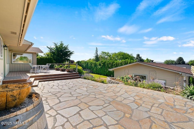 5310 W Lincoln Ave, Yakima, WA 98908 - view of patio with a wooden deck and outdoor dining area
