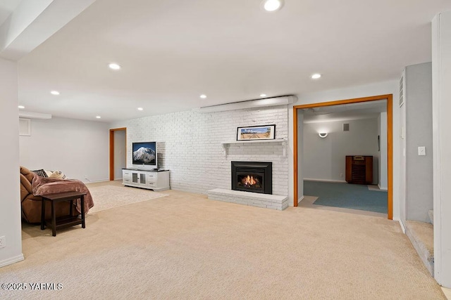 5310 W Lincoln Ave, Yakima, WA 98908 - living room featuring light carpet, a fireplace, and recessed lighting