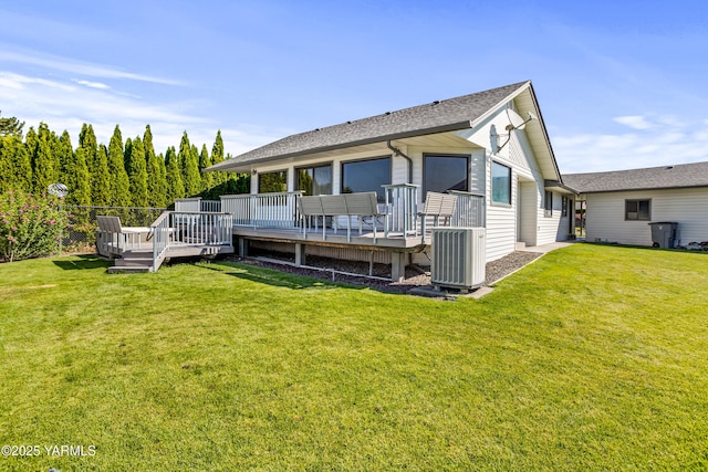 5504 Pear Butte Dr, Yakima, WA 98901 - back of house featuring roof with shingles, a wooden deck, and a yard