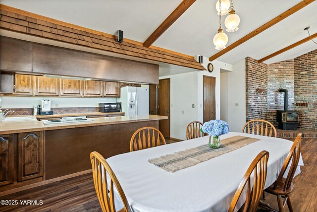 5504 Pear Butte Dr, Yakima, WA 98901 - dining room with dark wood finished floors and a wood stove