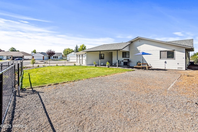 5504 Pear Butte Dr, Yakima, WA 98901 - back of house featuring a shingled roof and a patio