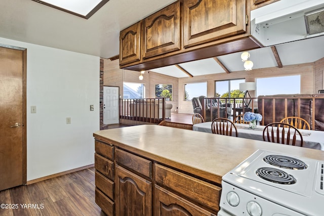 5504 Pear Butte Dr, Yakima, WA 98901 - kitchen with white electric range, dark wood-type flooring, and light countertops