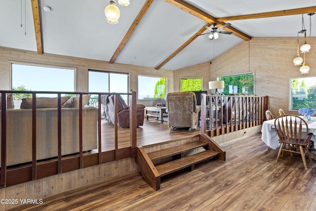 5504 Pear Butte Dr, Yakima, WA 98901 - living room with wooden walls, wood finished floors, and a ceiling fan