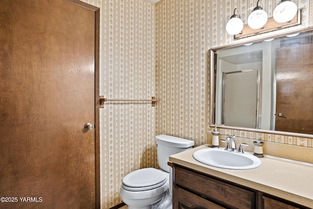 5504 Pear Butte Dr, Yakima, WA 98901 - full bath featuring wallpapered walls, vanity, and a shower with door