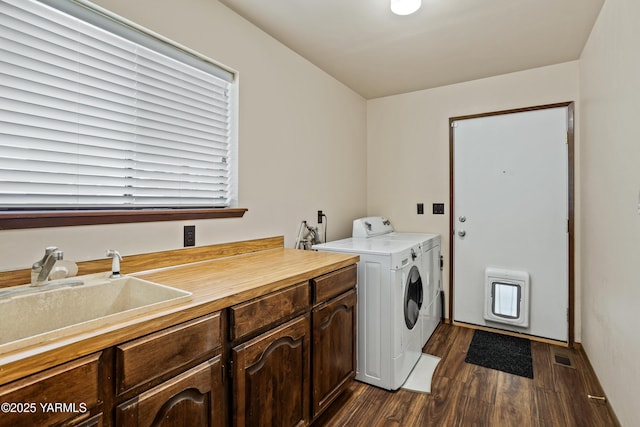 5504 Pear Butte Dr, Yakima, WA 98901 - laundry room with cabinet space, separate washer and dryer, and dark wood-type flooring