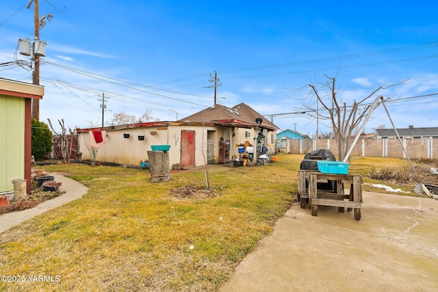 view of yard with a patio and a fenced backyard