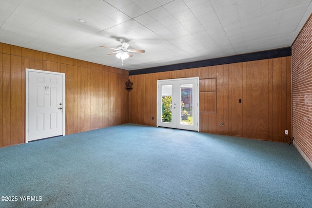 808 S 72nd Ave, Yakima, WA 98908 - carpeted empty room with a ceiling fan and wood walls