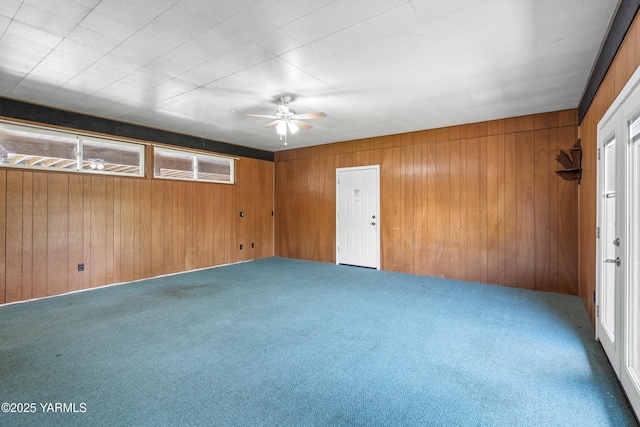 808 S 72nd Ave, Yakima, WA 98908 - spare room with carpet, wood walls, and ceiling fan
