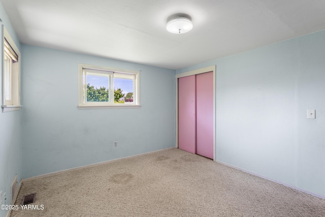 808 S 72nd Ave, Yakima, WA 98908 - unfurnished bedroom with carpet flooring, a closet, and baseboards