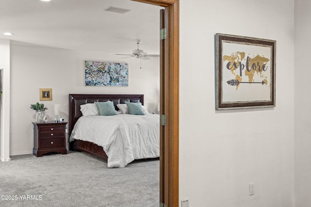 bedroom featuring recessed lighting, visible vents, and light colored carpet