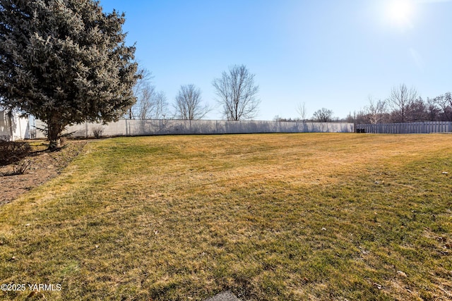 view of yard featuring fence