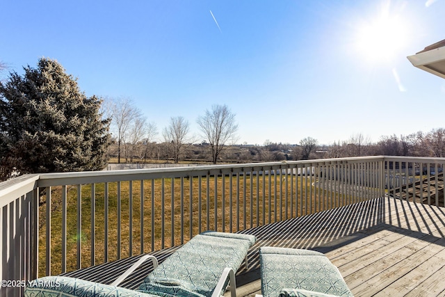 deck featuring a lawn