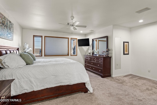 bedroom with recessed lighting, visible vents, light carpet, ceiling fan, and baseboards