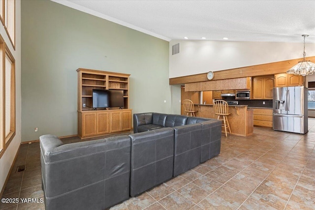 living room featuring high vaulted ceiling, visible vents, a textured ceiling, and recessed lighting