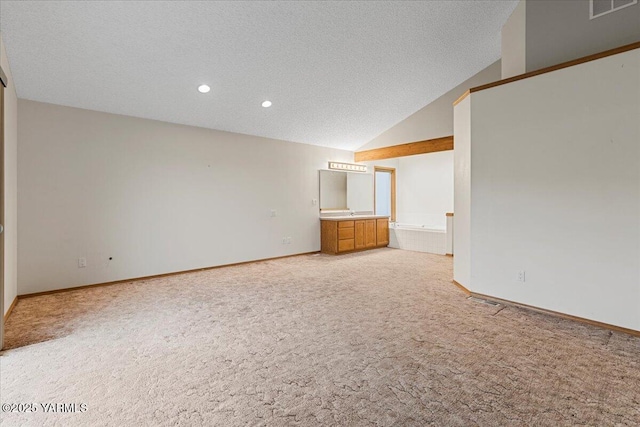 unfurnished room featuring light carpet, baseboards, visible vents, a textured ceiling, and recessed lighting