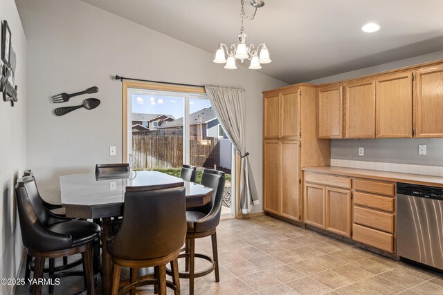 dining area with a notable chandelier, recessed lighting, and lofted ceiling