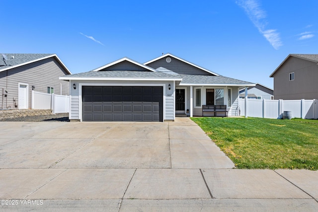 single story home featuring covered porch, driveway, fence, a front lawn, and an attached garage