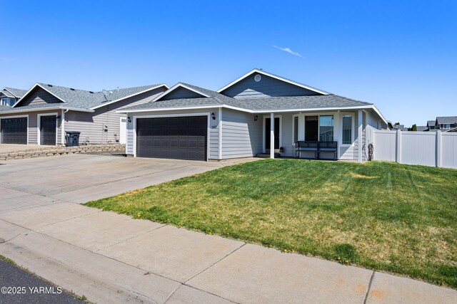 single story home featuring a porch, roof with shingles, fence, a front lawn, and an attached garage