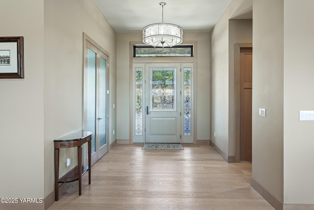 5506 Marilane St, Yakima, WA 98908 - foyer featuring a chandelier and light wood-style flooring