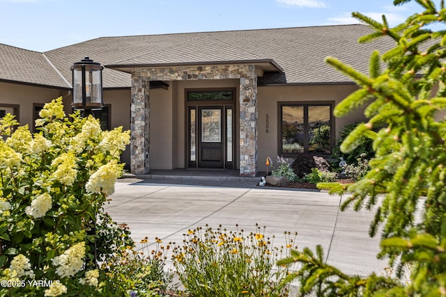 5506 Marilane St, Yakima, WA 98908 - entrance to property featuring stucco siding, stone siding, concrete driveway, and french doors