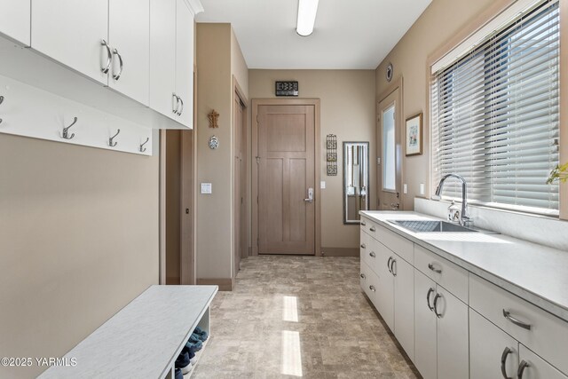 5506 Marilane St, Yakima, WA 98908 - laundry room featuring a sink and light floors