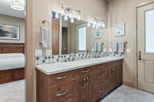 5506 Marilane St, Yakima, WA 98908 - full bath with double vanity, backsplash, and connected bathroom