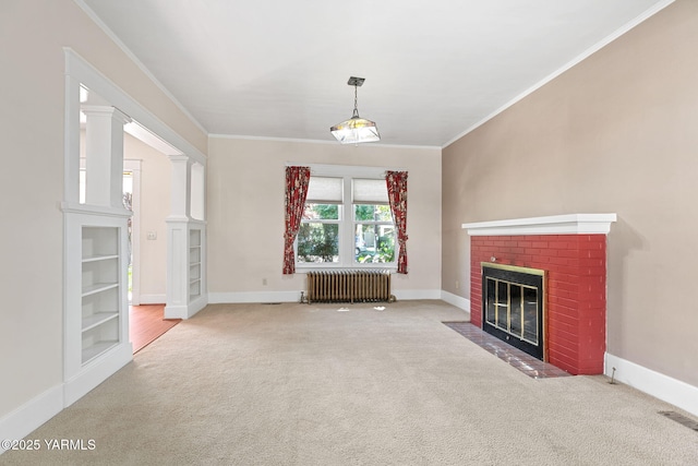 14 N 37th Ave, Yakima, WA 98902 - unfurnished living room with radiator heating unit, carpet floors, a fireplace, and crown molding