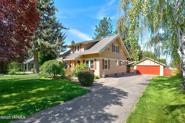 14 N 37th Ave, Yakima, WA 98902 - view of front of home featuring a garage, a chimney, a front yard, and roof with shingles